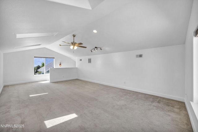 1655 Chiquita Cir, Minden, NV 89423 - additional living space with vaulted ceiling, a ceiling fan, carpet flooring, and baseboards