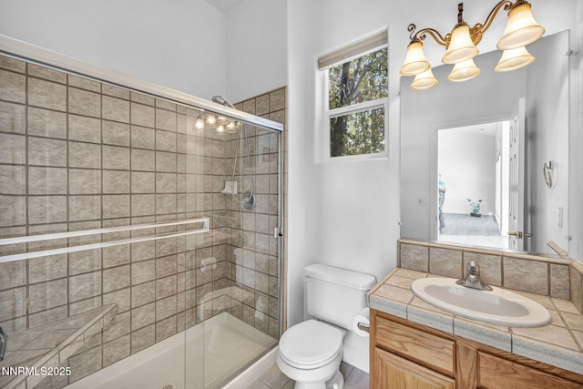 1655 Chiquita Cir, Minden, NV 89423 - bathroom with toilet, a shower stall, vanity, and a chandelier