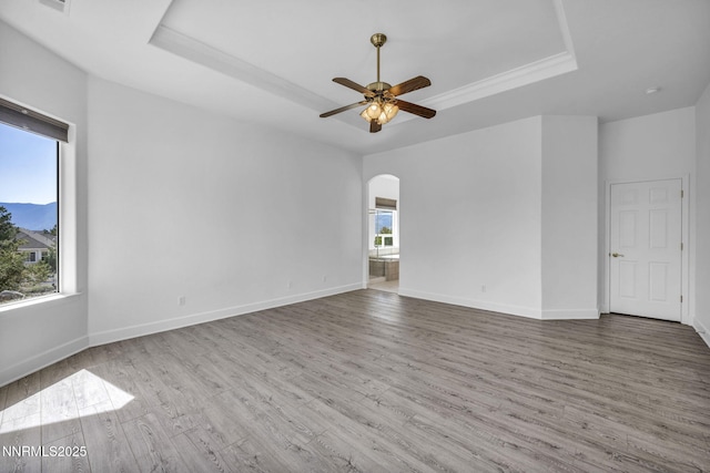 1655 Chiquita Cir, Minden, NV 89423 - spare room with a raised ceiling, healthy amount of natural light, wood finished floors, and a ceiling fan