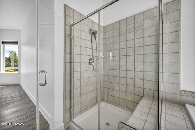 1655 Chiquita Cir, Minden, NV 89423 - full bath with a stall shower, wood finished floors, and baseboards