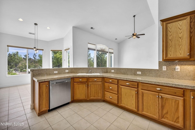 1655 Chiquita Cir, Minden, NV 89423 - kitchen featuring stainless steel dishwasher, brown cabinets, ceiling fan, light tile patterned flooring, and recessed lighting