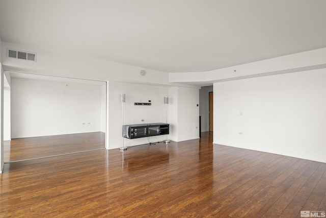 255 N Sierra St Unit 1011, Reno, NV 89501 - unfurnished living room with wood finished floors and heating unit