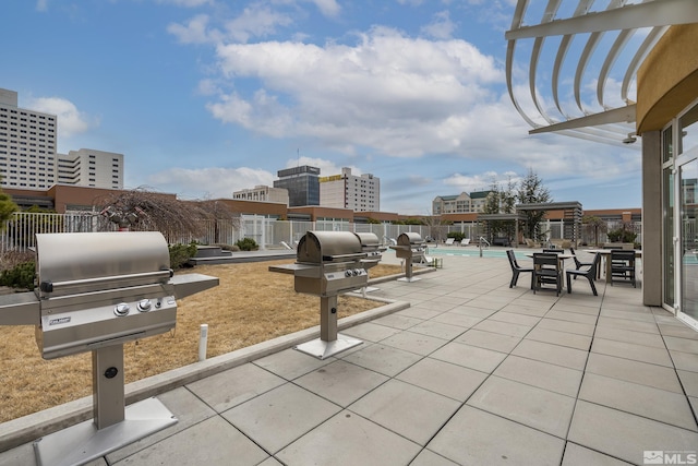 255 N Sierra St Unit 1011, Reno, NV 89501 - view of community with a pool, a patio, and fence