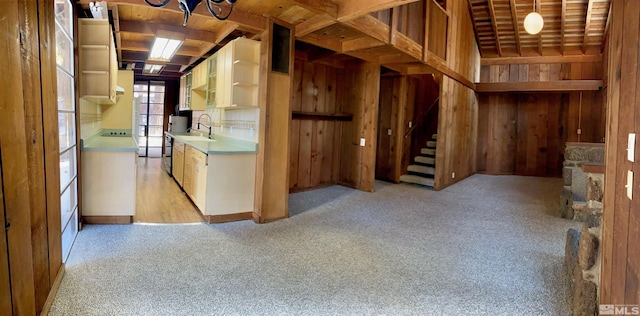 712 Lakeview Dr, Zephyr Cove, NV 89448 - below grade area with light carpet, a sink, stairs, wood walls, and wood ceiling