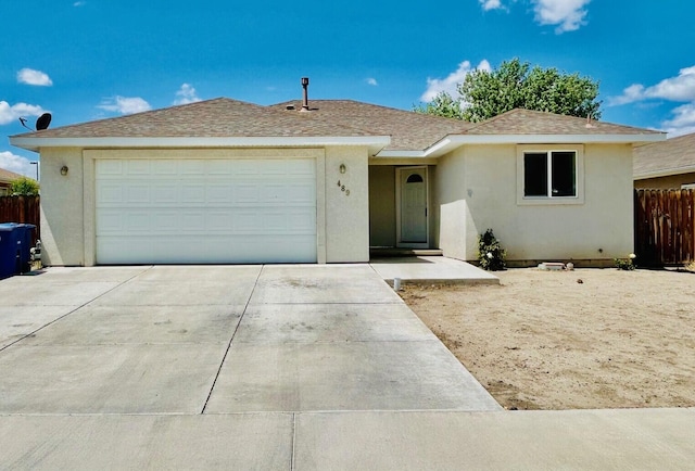 489 Torrey Pines Dr, Fallon, NV 89406 - ranch-style house featuring driveway, stucco siding, fence, a garage, and roof with shingles