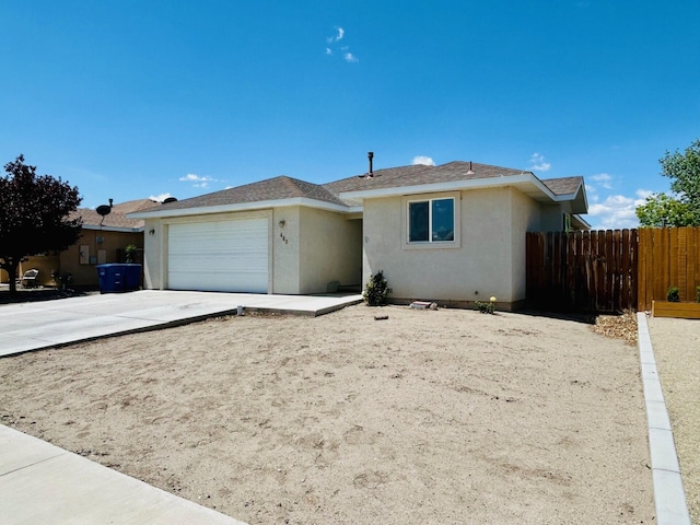 489 Torrey Pines Dr, Fallon, NV 89406 - ranch-style house with stucco siding, a garage, fence, driveway, and a shingled roof
