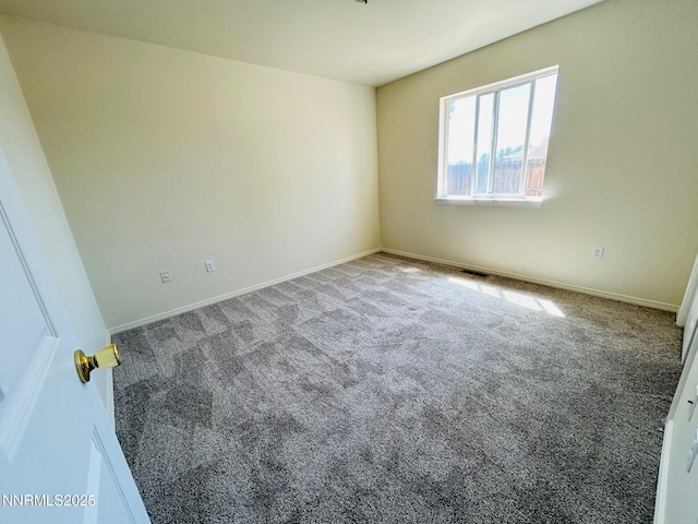 489 Torrey Pines Dr, Fallon, NV 89406 - carpeted spare room featuring baseboards