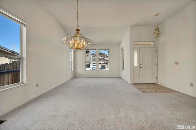1675 Crestside Ct, Sparks, NV 89436 - unfurnished dining area featuring carpet flooring, a chandelier, and baseboards