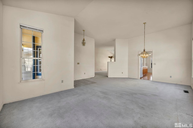 1675 Crestside Ct, Sparks, NV 89436 - carpeted spare room with a chandelier and baseboards