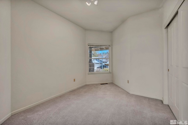 1675 Crestside Ct, Sparks, NV 89436 - unfurnished bedroom with light carpet, baseboards, and a closet