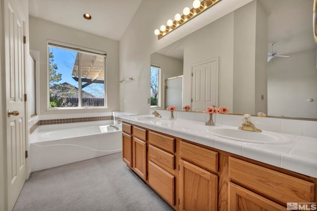 1675 Crestside Ct, Sparks, NV 89436 - bathroom featuring a garden tub, double vanity, carpet floors, ceiling fan, and an enclosed shower