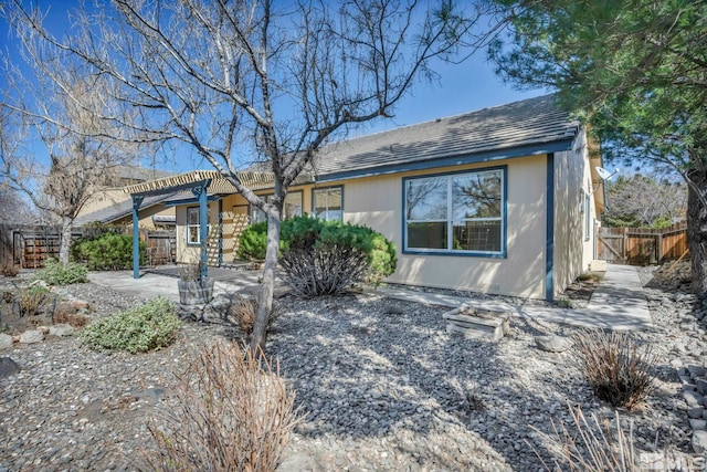 1675 Crestside Ct, Sparks, NV 89436 - view of front of house featuring a pergola, a patio, and fence