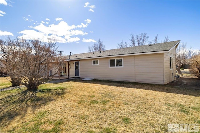 1116 Willow St, Gardnerville, NV 89410 - back of house with a lawn