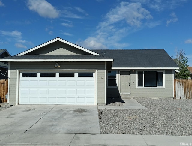 1412 Indian Trl, Fernley, NV 89408 - ranch-style home featuring concrete driveway, fence, and an attached garage
