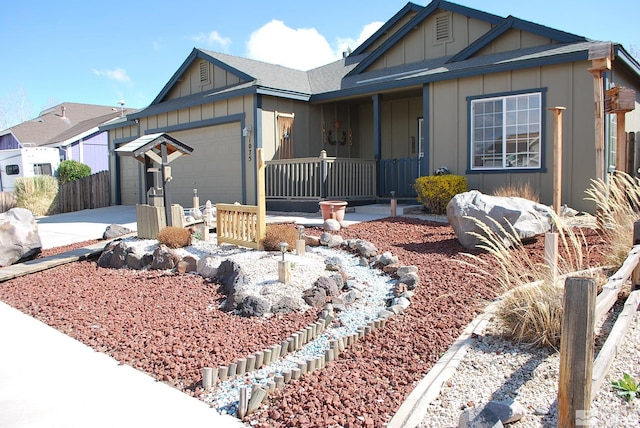 1075 Aster Ln, Fernley, NV 89408 - ranch-style house featuring board and batten siding, a garage, driveway, and covered porch
