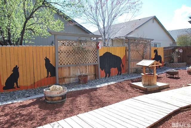 1075 Aster Ln, Fernley, NV 89408 - view of patio / terrace featuring fence and a wooden deck