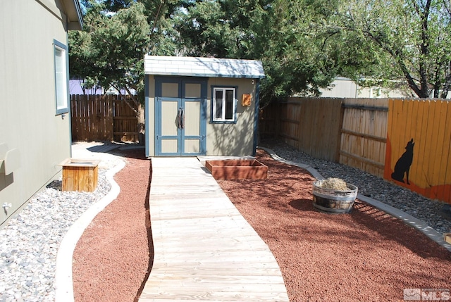 1075 Aster Ln, Fernley, NV 89408 - view of shed featuring a fenced backyard