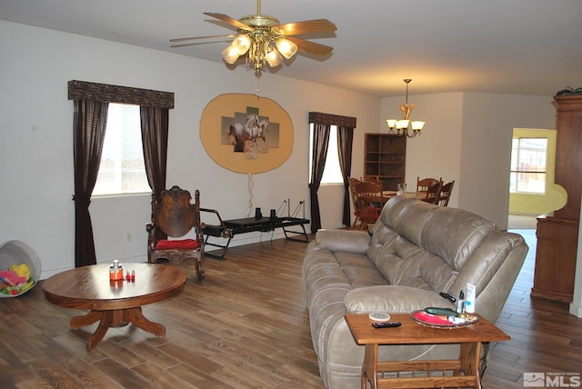 1075 Aster Ln, Fernley, NV 89408 - living area with a chandelier, wood finished floors, healthy amount of natural light, and ceiling fan