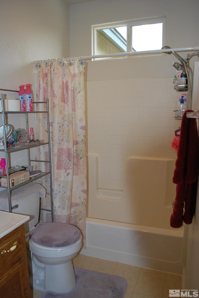 1075 Aster Ln, Fernley, NV 89408 - full bathroom featuring toilet, shower / bath combination with curtain, vanity, and tile patterned flooring
