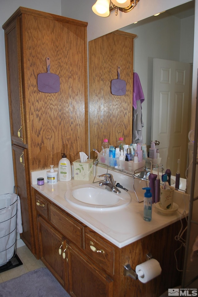 1075 Aster Ln, Fernley, NV 89408 - bathroom featuring tile patterned flooring and vanity