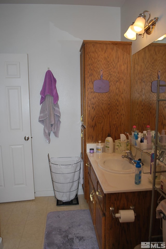 1075 Aster Ln, Fernley, NV 89408 - bathroom with tile patterned flooring and vanity