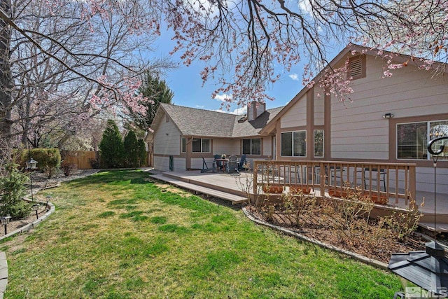 1673 Lantana Dr, Minden, NV 89423 - rear view of property with a deck and a chimney
