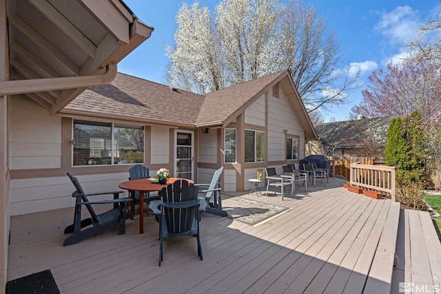 1673 Lantana Dr, Minden, NV 89423 - wooden terrace with outdoor dining area