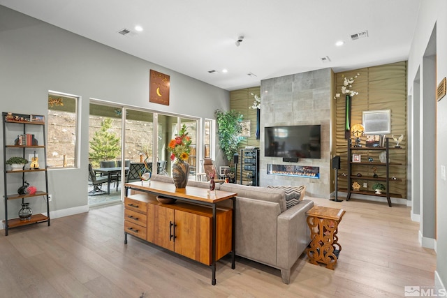9179 Graycliff Ln, Reno, NV 89523 - living room featuring baseboards, light wood-type flooring, and recessed lighting