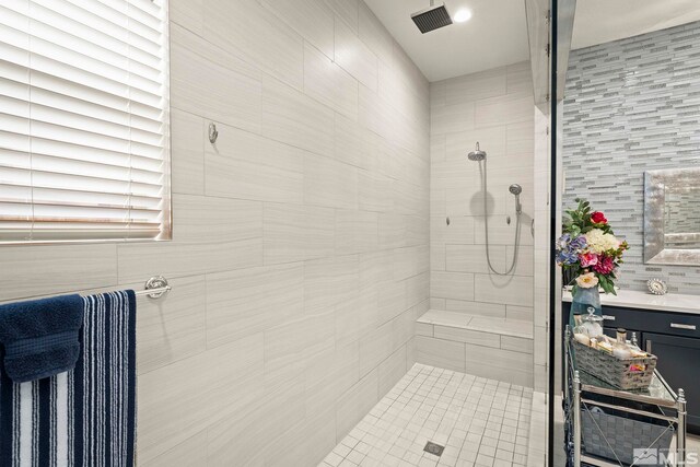 9179 Graycliff Ln, Reno, NV 89523 - full bath featuring a tile shower and vanity
