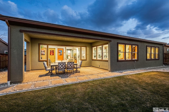 9179 Graycliff Ln, Reno, NV 89523 - back of property featuring a patio area and stucco siding