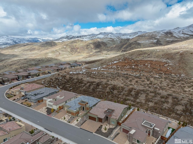 9179 Graycliff Ln, Reno, NV 89523 - aerial overview of property's location with a mountain backdrop and nearby suburban area