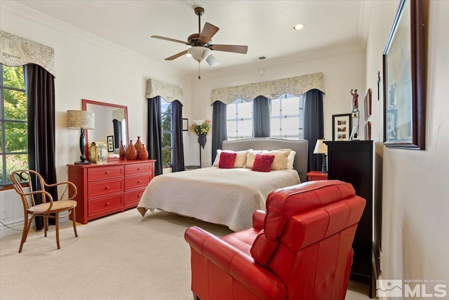carpeted bedroom featuring crown molding, a ceiling fan, and recessed lighting