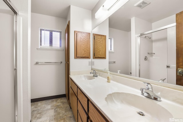 8 Katherine Ct, Stateline, NV 89449 - full bathroom featuring healthy amount of natural light, a stall shower, baseboards, and double vanity