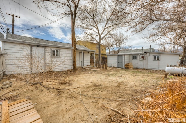 742 D St, Hawthorne, NV 89415 - view of yard with an outdoor structure and fence