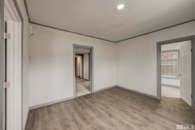 742 D St, Hawthorne, NV 89415 - unfurnished bedroom with wood finished floors, baseboards, and recessed lighting