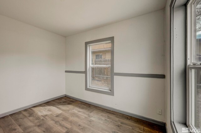 742 D St, Hawthorne, NV 89415 - spare room with wood finished floors and baseboards