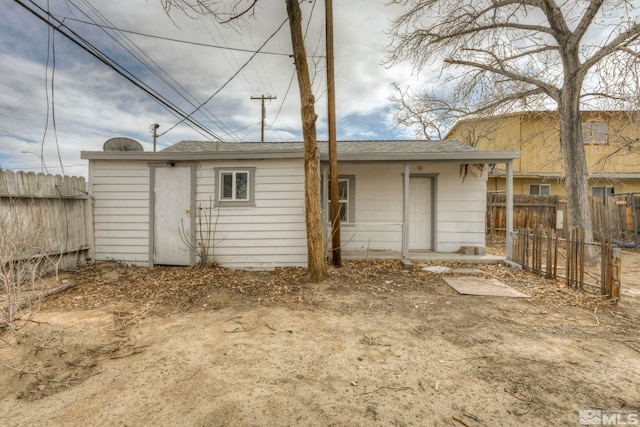 742 D St, Hawthorne, NV 89415 - rear view of house with fence