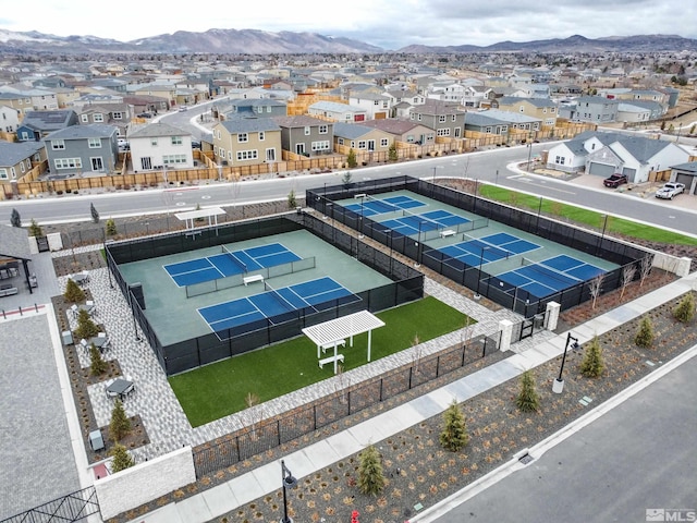 aerial view of residential area with a mountain backdrop