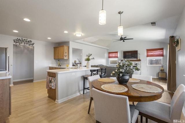 9834 Suncrest Dr, Reno, NV 89506 - dining room with light wood-type flooring, recessed lighting, ceiling fan, lofted ceiling, and baseboards