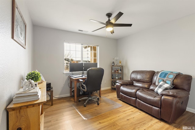 9834 Suncrest Dr, Reno, NV 89506 - office area featuring ceiling fan, light wood finished floors, and baseboards