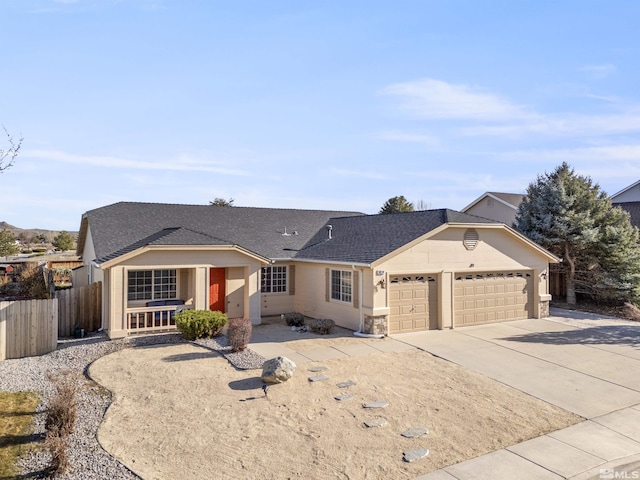9834 Suncrest Dr, Reno, NV 89506 - ranch-style home with an attached garage, driveway, fence, covered porch, and roof with shingles
