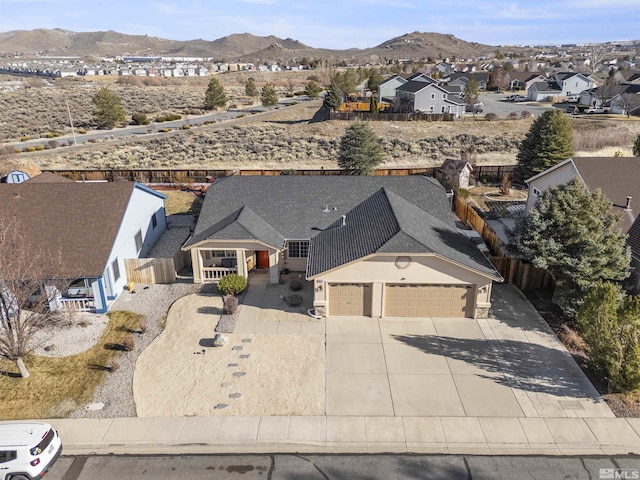 9834 Suncrest Dr, Reno, NV 89506 - aerial perspective of suburban area featuring a mountainous background