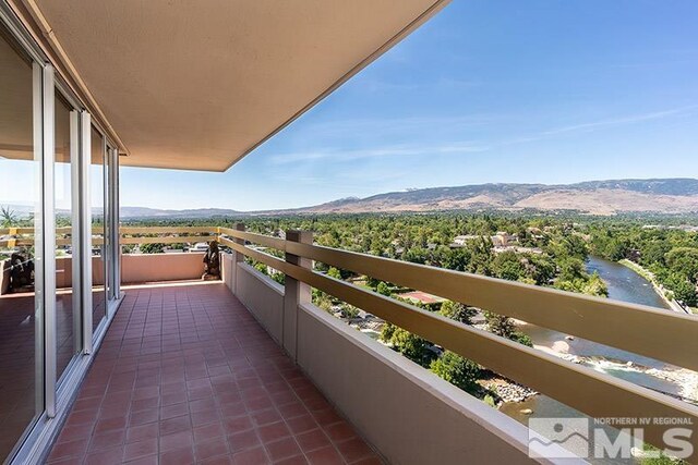 100 N Arlington Ave Unit 14F, Reno, NV 89501 - balcony featuring a water and mountain view