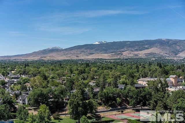 100 N Arlington Ave Unit 14F, Reno, NV 89501 - view of mountain backdrop featuring a forest