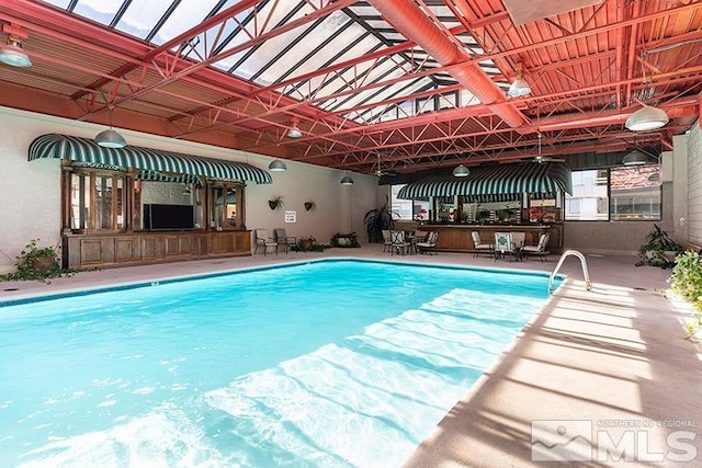 100 N Arlington Ave Unit 14F, Reno, NV 89501 - indoor community pool featuring a patio