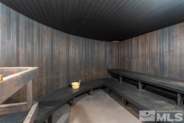 100 N Arlington Ave Unit 14F, Reno, NV 89501 - relaxing sauna / steam room featuring wood walls, finished concrete floors, and wood ceiling