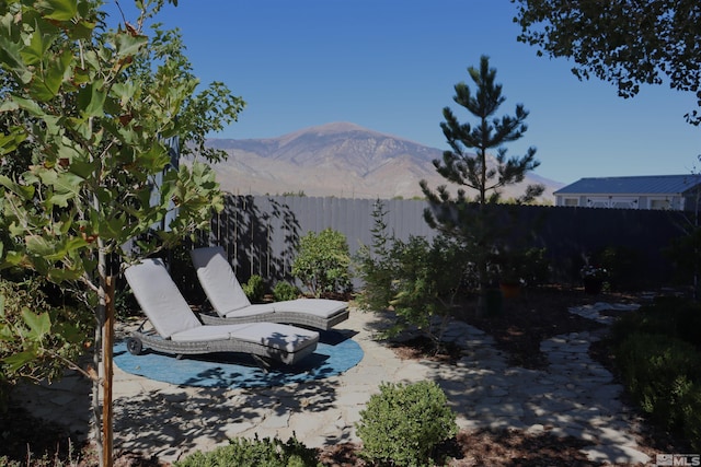 255 Ash St, Hawthorne, NV 89415 - view of pool featuring a mountain view, a fenced backyard, and a patio