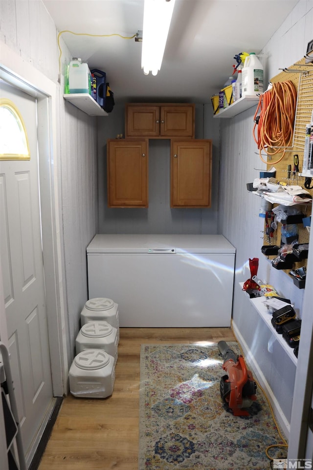 255 Ash St, Hawthorne, NV 89415 - clothes washing area with light wood-style floors