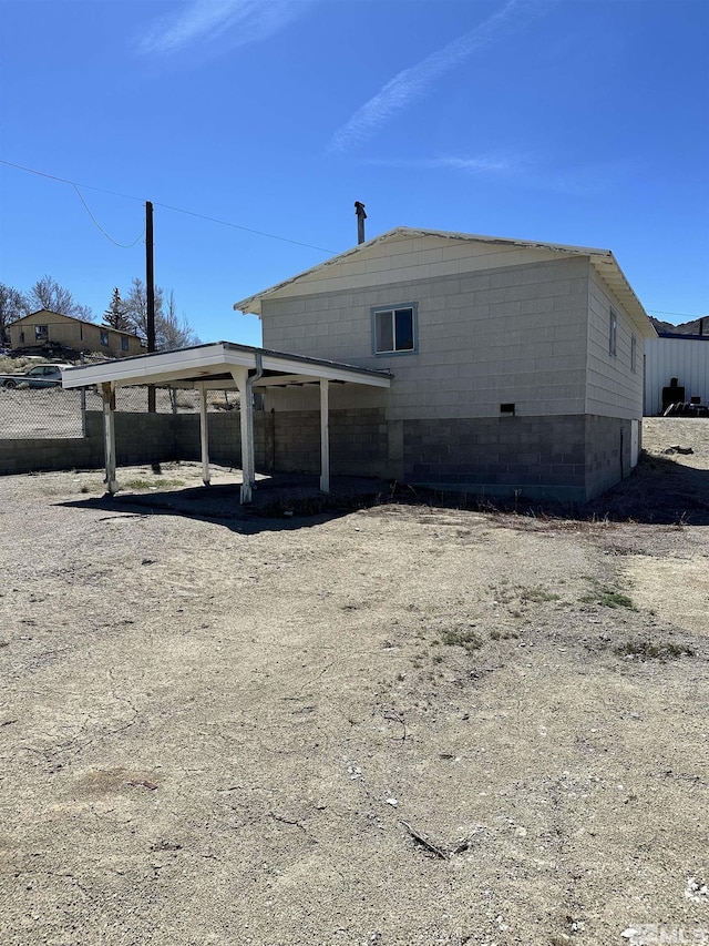 481 S Frankie St, Tonopah, NV 89049 - view of side of property with concrete block siding