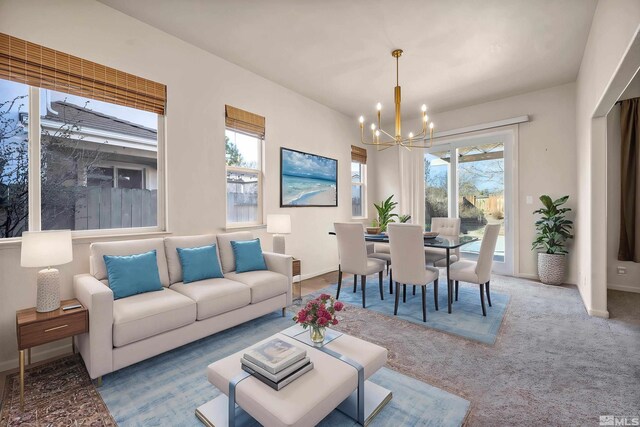 10055 Zephyr Heights Dr, Reno, NV 89521 - carpeted living room featuring a chandelier, healthy amount of natural light, and baseboards